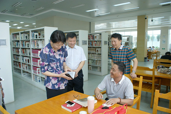 信阳市图书馆人事任命启动，文化事业迎新篇章